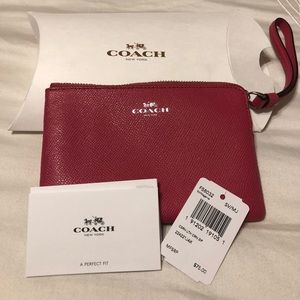 Coach wristlet never used, with tags & box